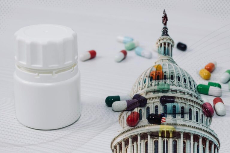 Pill bottle with pills overlaying goveernment building