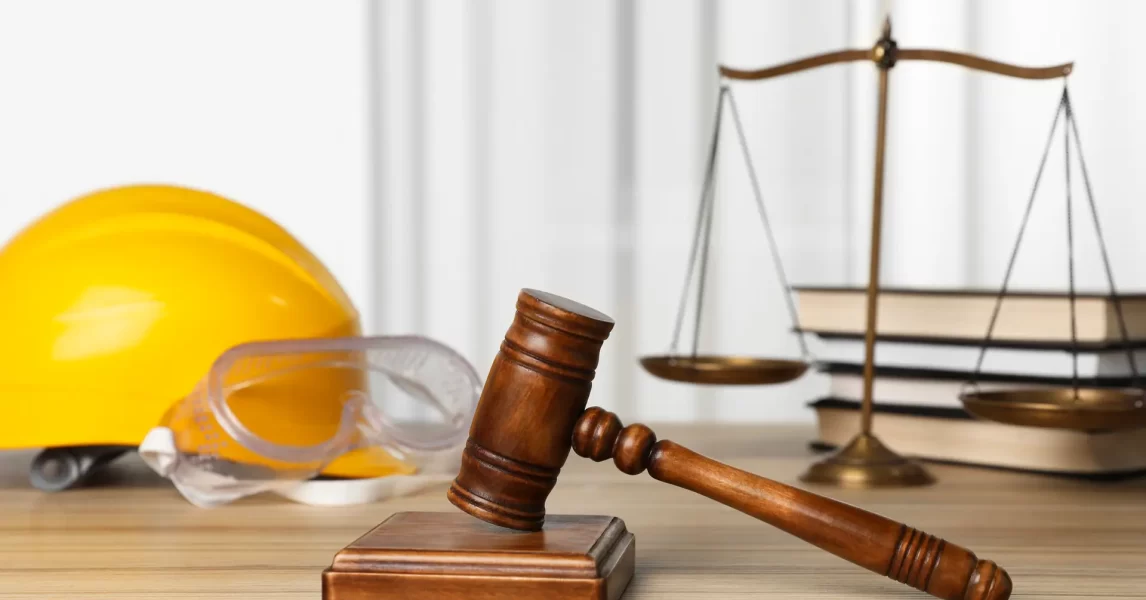 Hard Hat with Judge's Gavel and Law Scale